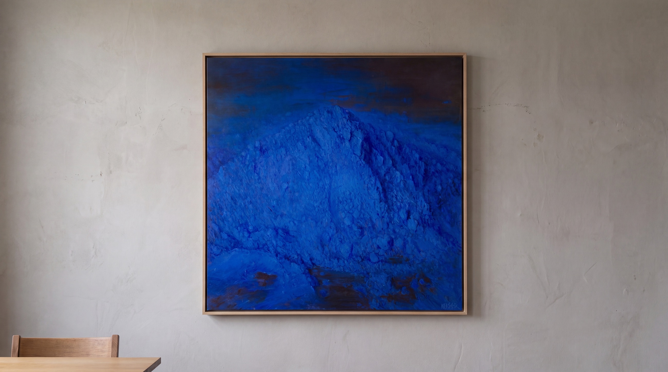 Blue, a 45 by 45 inch painting by Duane Keiser, hanging framed on a plaster wall